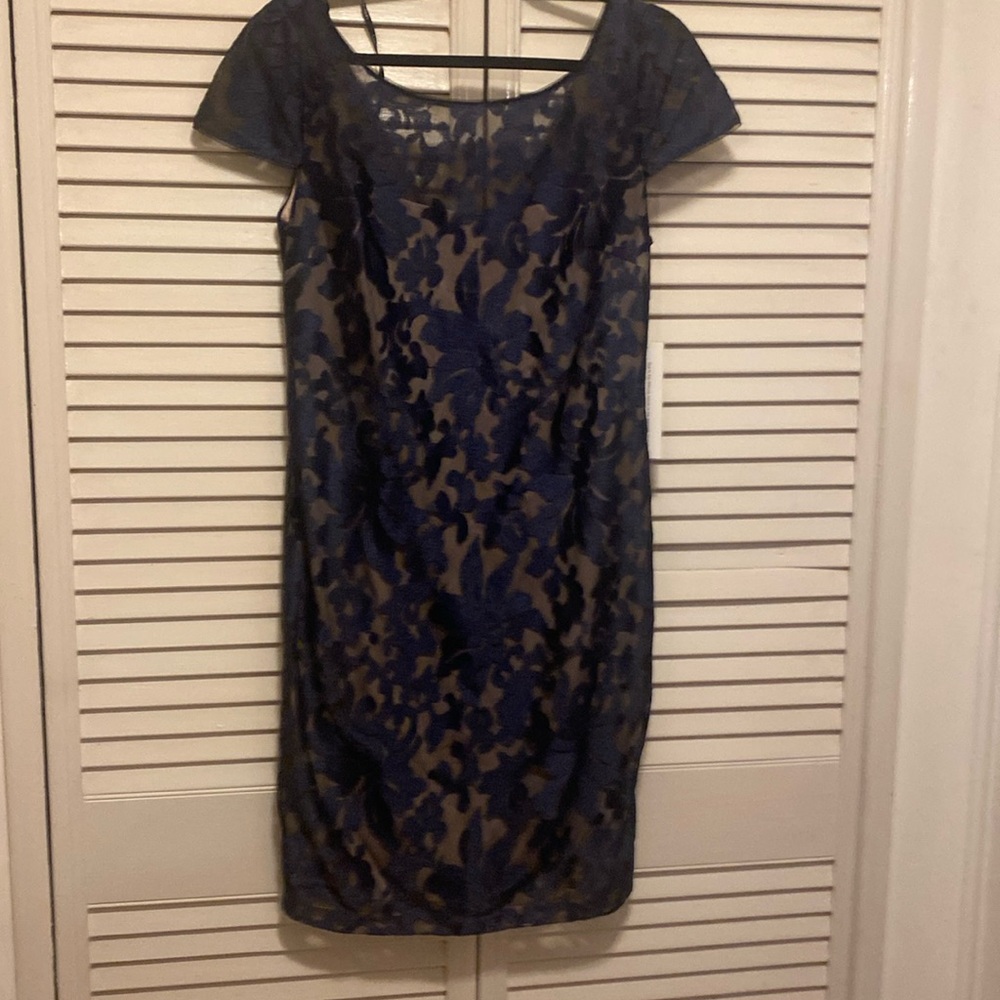 Black and taupe cocktail dress.